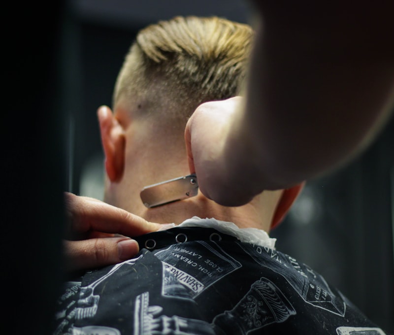 A high skin fade clipped in at the back